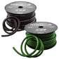 Dos bobinas de cable de alimentación Deaf Bonce Machete MPC-4GA / 20mm² 30m, una negra y otra verde, cada una con el cable enrollado y algo de longitud extendida hacia fuera.