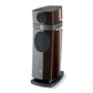 La Focal Scala Utopia Evo est une enceinte colonne 3 voies haut de gamme en noir et bois foncé, avec deux grilles rondes et le logo en bas de la face avant.