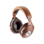 Focal Stellia over-ear headphones with beryllium drivers, textured metallic finish, and padded headband, shown on a white background.