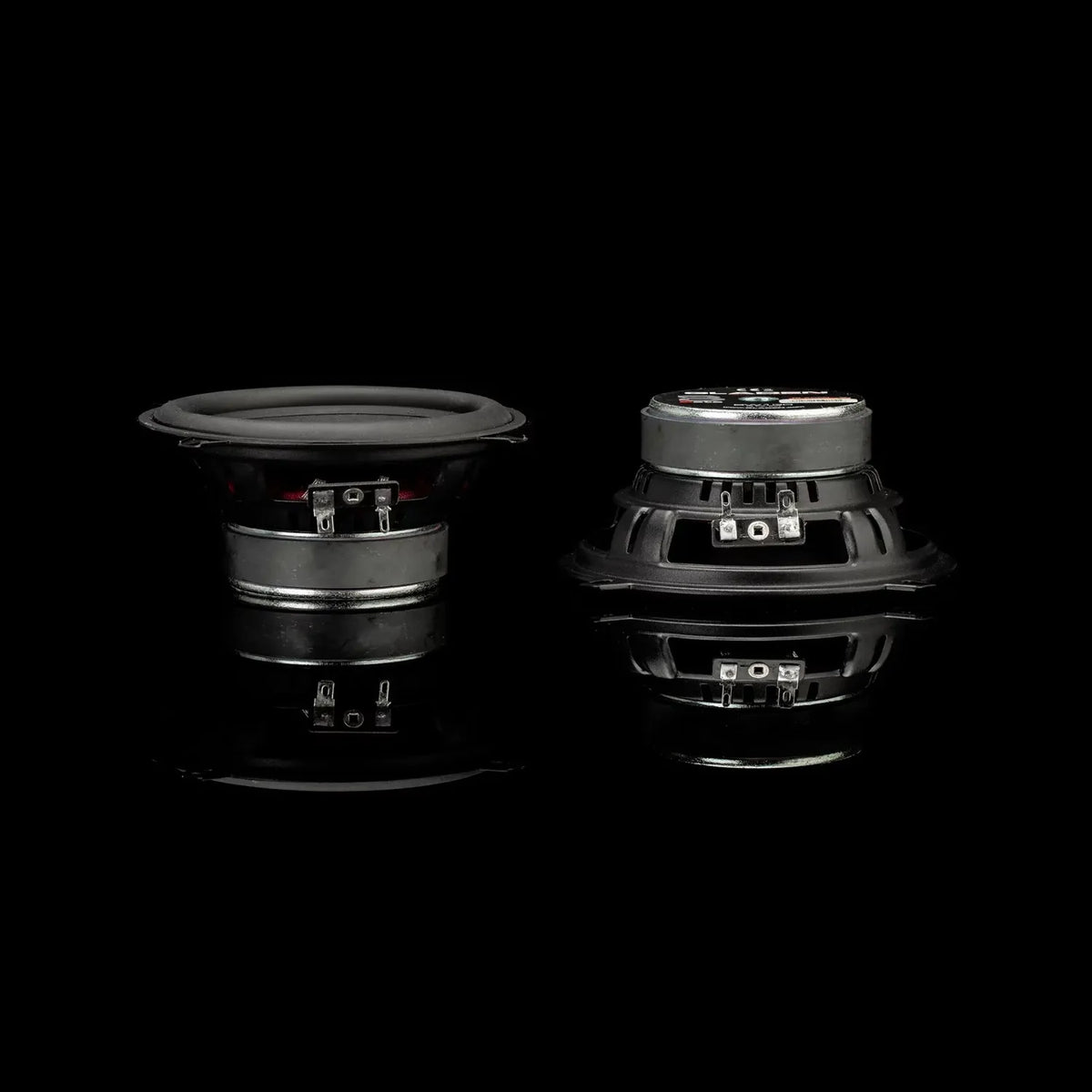 Two Gladen Beta 130.2 speakers are displayed against black, showcasing their build—ideal for a premium 2-way component car audio system.