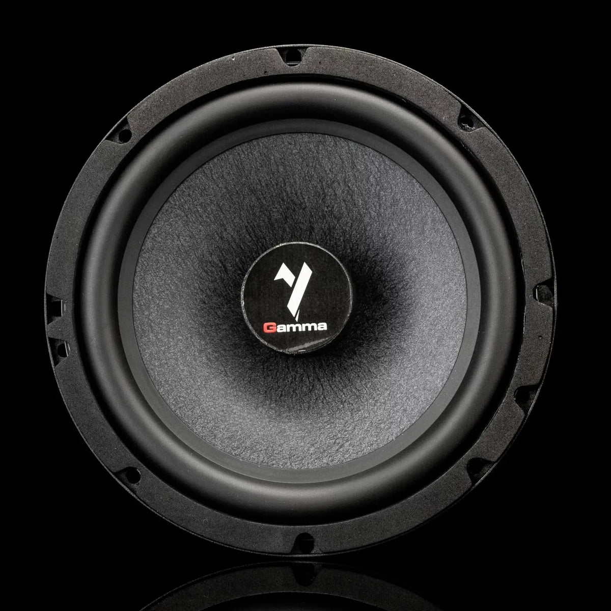 A close-up of the Gladen Gamma 165.2 Slim showcases its slim design and center Gamma logo, set against a black background.