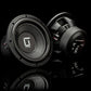 Twee zwarte Gladen Sigma SSWX10-subwoofers, afgebeeld tegen een zwarte achtergrond, die een hoogwaardig ontwerp laten zien – perfect voor elke hoogwaardige car-audio- of subwooferopstelling.