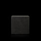 A compact black Gladen Subbox-Buz.1 is centered on a plain black background, highlighting its minimalist, monochromatic design.