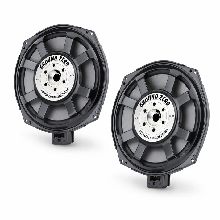 Two black Ground Zero GZCS 200BMW-SW4 car subwoofers with silver Ground Zero German Engineering center labels are shown on a white background.