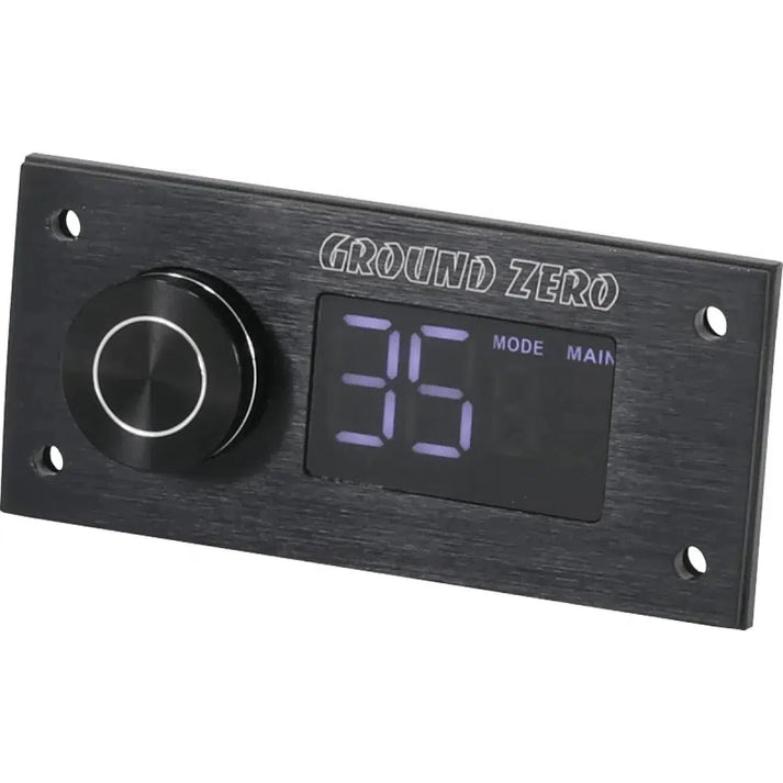 De Ground Zero GZDSP Remote PRO is een rechthoekig zwart audiobedieningspaneel met LCD-display, grote knop, kabelafstandsbediening en Ground Zero op de bovenkant.