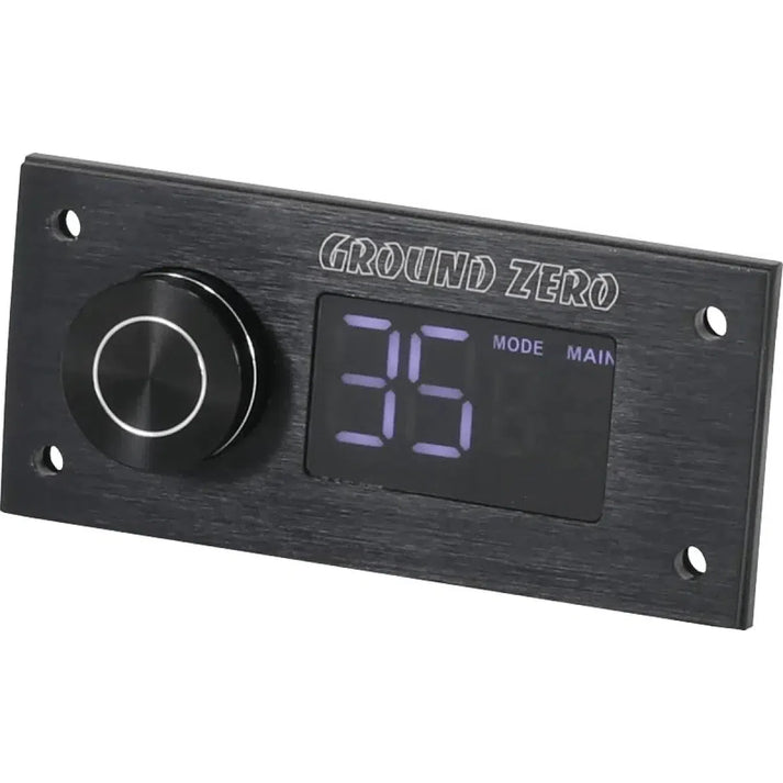 El Ground Zero GZDSP Remote PRO-X es un accesorio DSP negro rectangular con un mando redondo a la izquierda y una pantalla digital que muestra 35 MODE MAIN a la derecha.