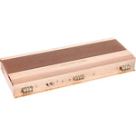 De Ground Zero GZPA Reference 2PURE is een goudkleurige 2-kanaals autoversterker met geribbelde lamellen en meerdere aansluitingen op het voorpaneel.
