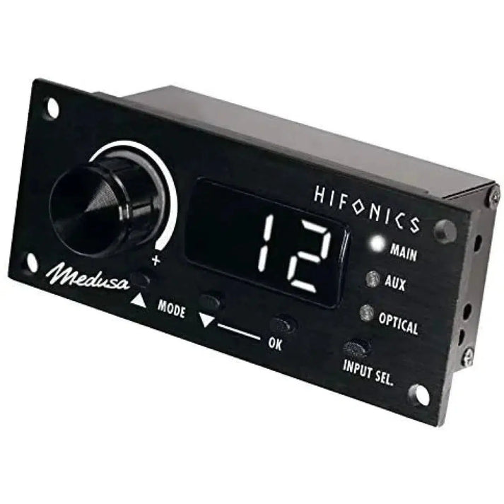 Pannello audio rettangolare nero del controller Hifonics RC-TRX con display digitale che mostra 12, manopola grande, pulsanti e opzioni di ingresso principale, ausiliario e ottico.