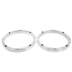 Two silver Masori Aluring 165-17 Universal für 6.5 Zoll rings with evenly spaced small black holes are placed side by side on a white background.
