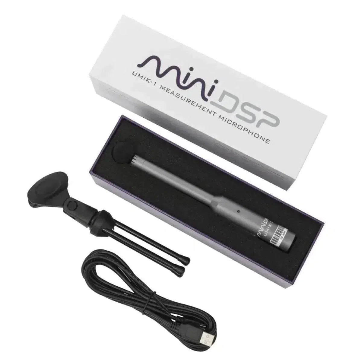 El kit miniDSP UMIK-1 V3 incluye un micrófono, un cable USB, un soporte y una caja, todo ello presentado sobre un fondo blanco.