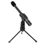 The miniDSP UMIK-2, a black USB-C microphone with foam windscreen, is shown on a small adjustable tripod stand against a white background.